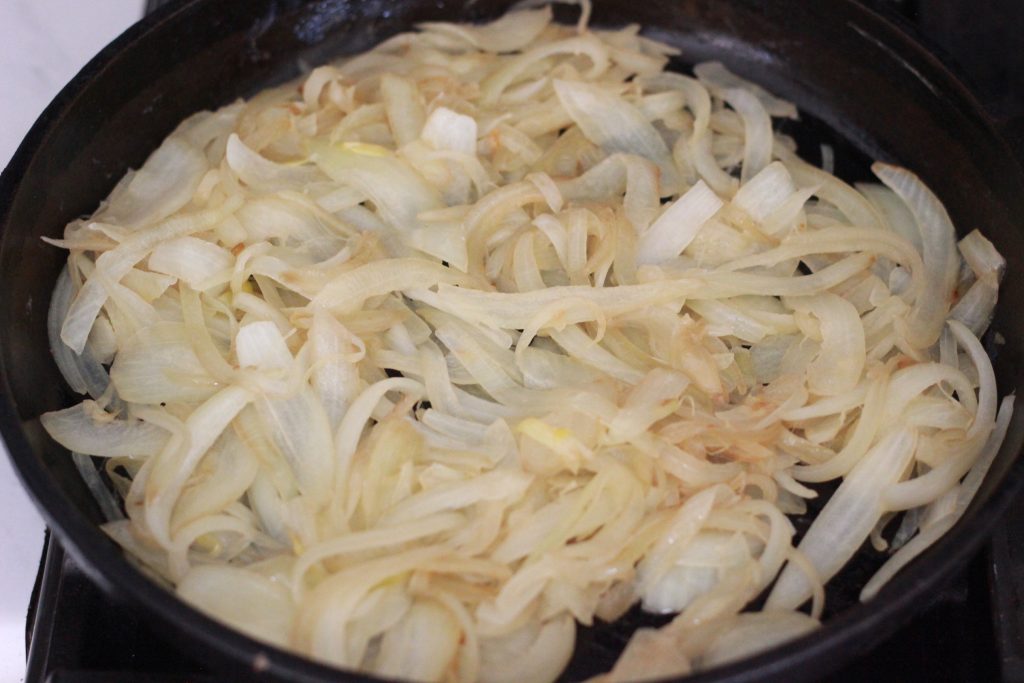 onions in cast iron skillet cooking